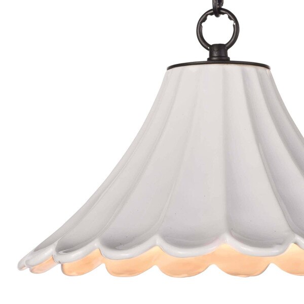 The white ceramic shade of a ceramic pendant light